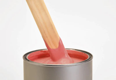 Image of mylands red wall primer pot opened with a brush inside